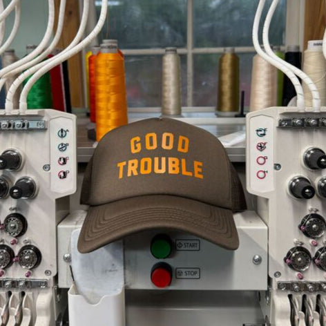 Good Trouble Trucker Hat (Walnut)